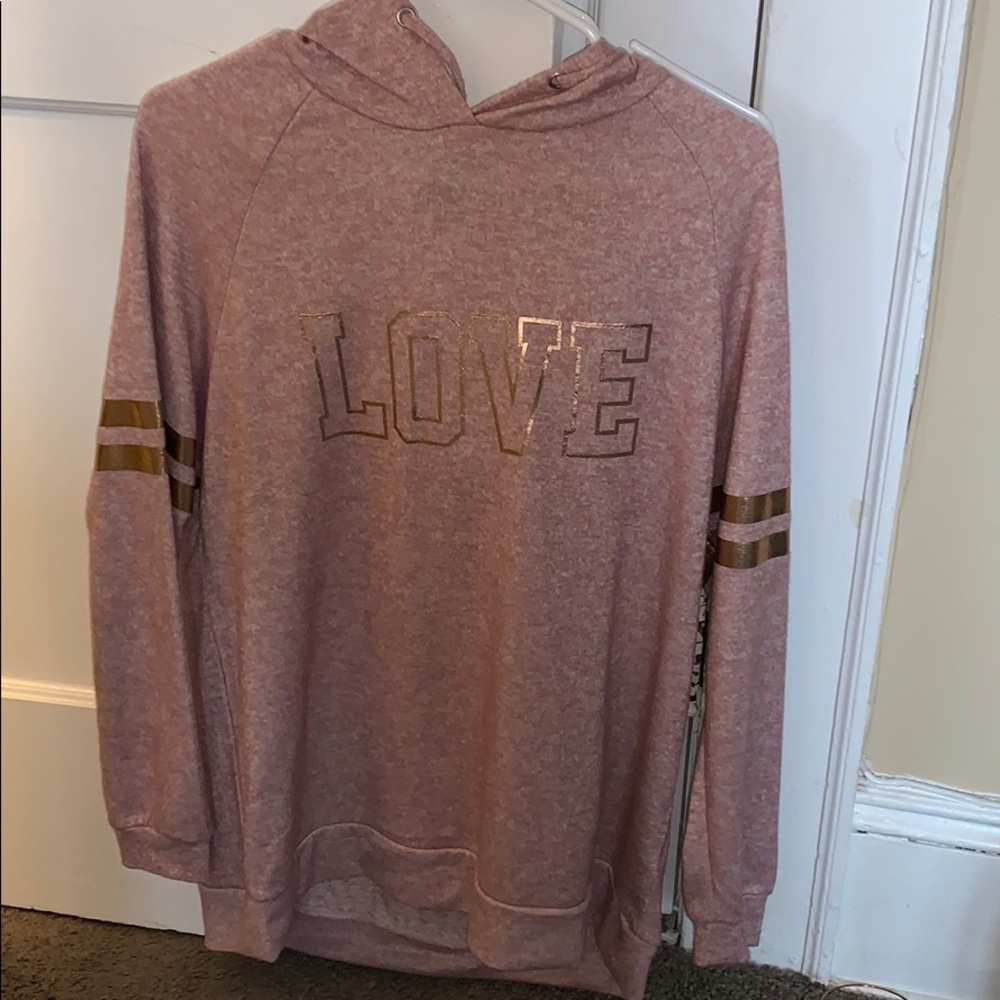 Mandee’s “love” rose gold sweatshirt